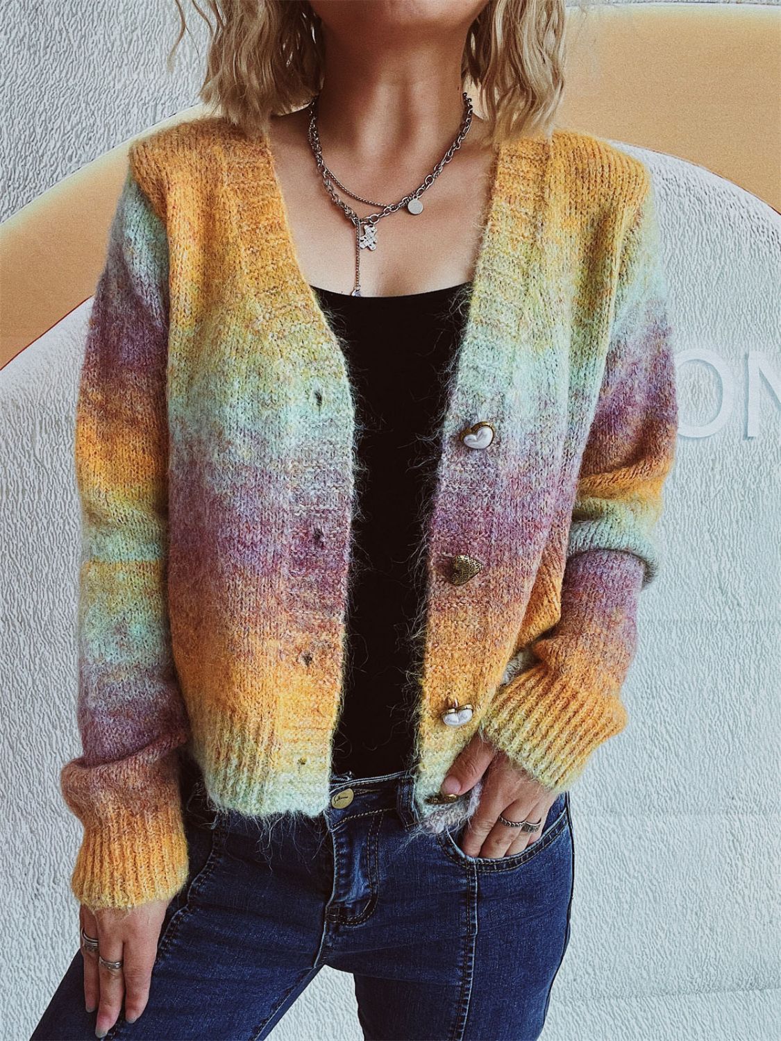 Ombre knit cardigan with heart buttons and a V-neck, featuring a multicolor acrylic blend.
