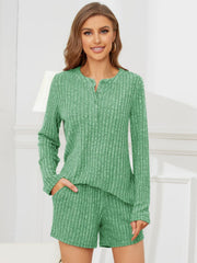 Green ribbed henley lounge set with button detail and matching shorts.