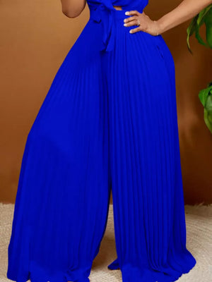 Blue pleated wide leg romper with tie front detail