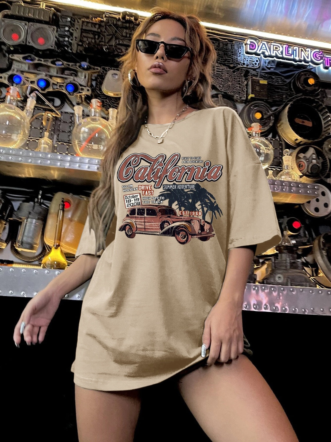 Tan oversized graphic tee dress with California car and palm tree print