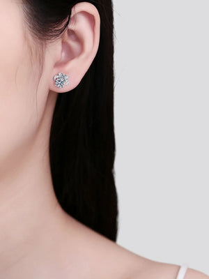 Silver moissanite floral cluster stud earrings with sparkling stones.