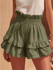 Army green ruffled high-waisted shorts with smocked waistband and tiered hem.