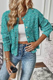 Confetti knit button-up cardigan in turquoise with a round neckline and button closure.