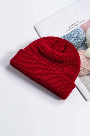 Red ribbed knit beanie with a turn-up cuff