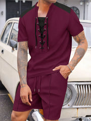Burgundy waffle knit lounge set with lace-up neckline and drawstring shorts.