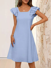 Light blue a-line dress with ruffled cap sleeves and square neckline.