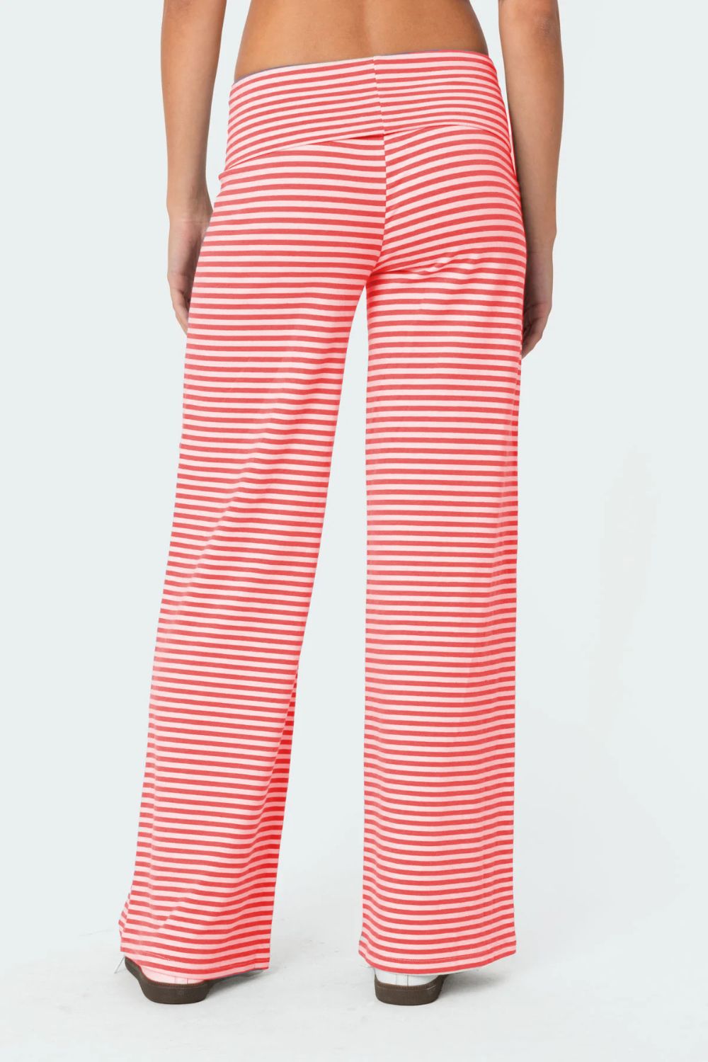 Coral and white striped palazzo pants with a wide waistband.