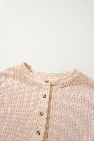 Textured ribbed collar jumpsuit in eggshell with button detail