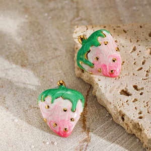 18k gold strawberry charm earrings with pink and green enamel and gold accents