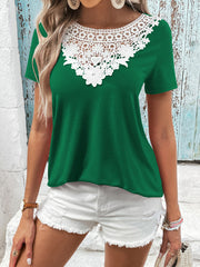 Green t-shirt with short sleeves and a white floral lace yoke detail.