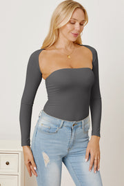 Dark gray long sleeve bodysuit with a square neckline and open back detail.
