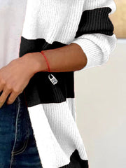 Colorblock ribbed open-front cardigan in black and white with a relaxed fit.