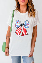 White graphic t-shirt with a red, white, and blue bow print.