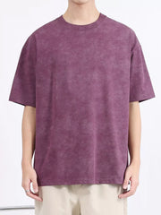 Men's relaxed fit t-shirt in purple with a washed effect, crew neck, and short sleeves.