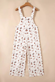 White cotton jumpsuit with desert motif, adjustable straps, and cropped wide legs.