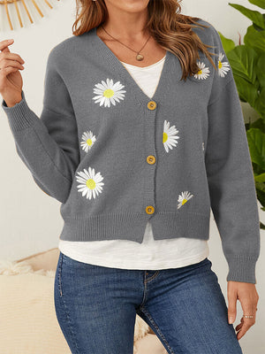 Grey V-neck cardigan with daisy embroidery and button front.