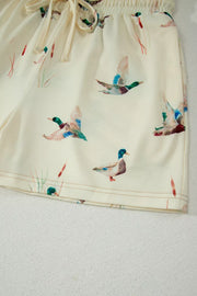 Beige pajama shorts with mallard duck print and drawstring waist.
