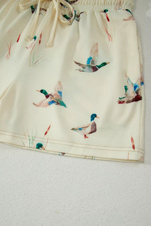 Beige pajama shorts with mallard duck print and drawstring waist.