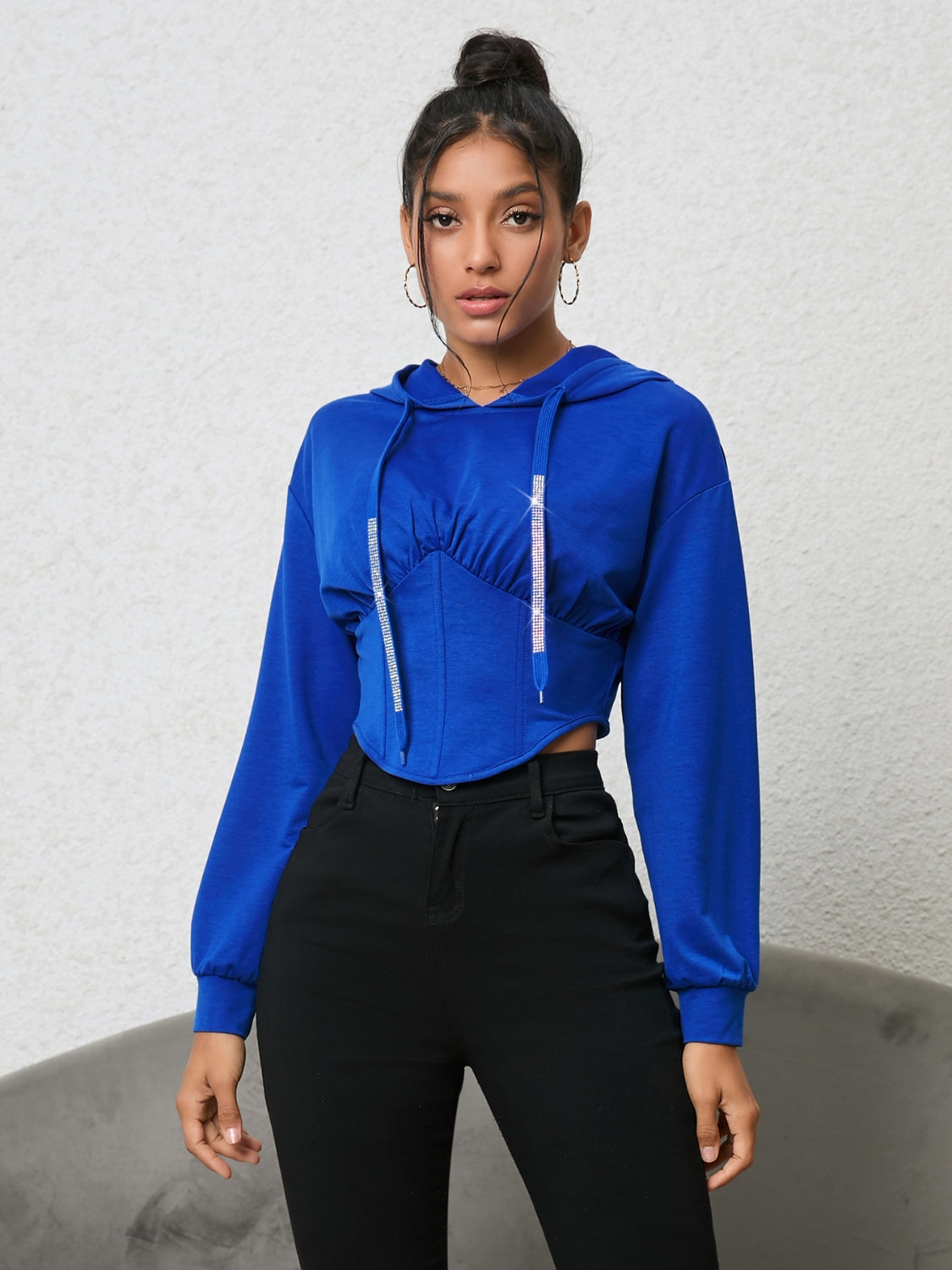 Royal blue cropped hoodie with corset detail and rhinestone drawstrings