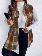 Oversized plaid shirt vest in brown, camel, and black with button front and chest pockets.
