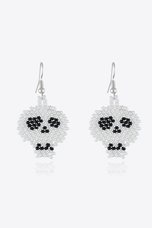 Beaded Skull earrings in white and black, featuring beaded eyes and mouth detail.