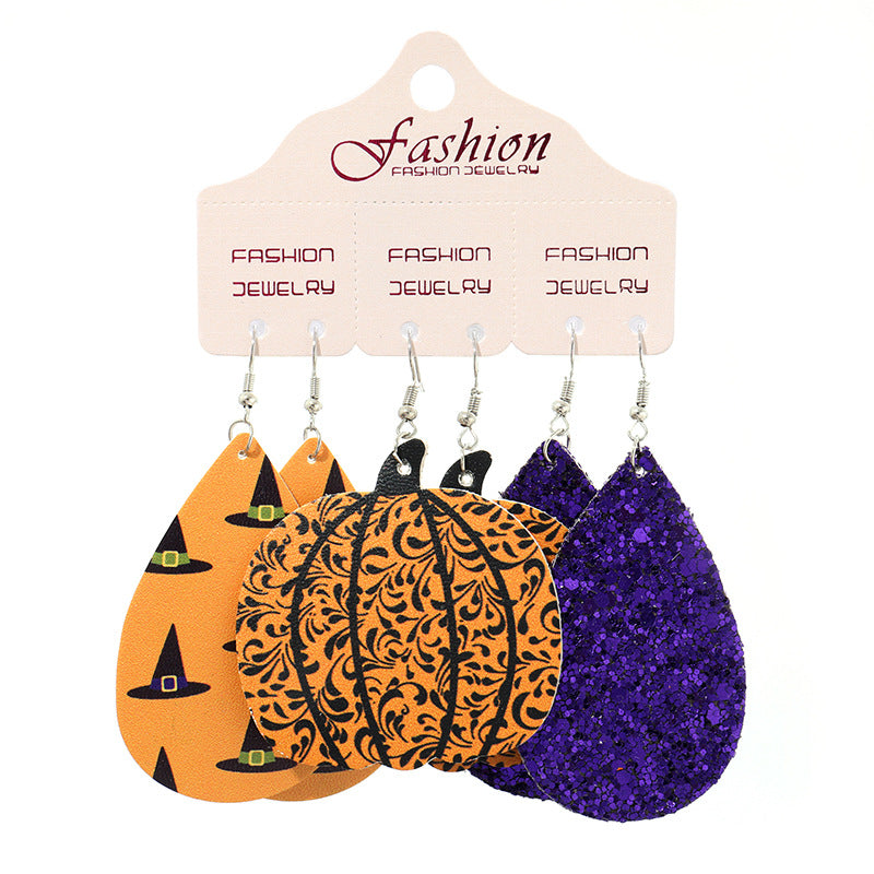Halloween dangle earrings set with pumpkins, witch hats, and glitter.