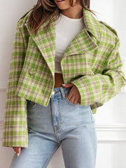 Lime plaid boxy cropped blazer with double-breasted closure and notched lapels.