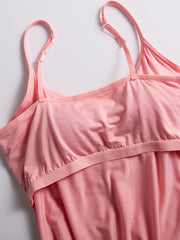 Pink soft-cup cami with adjustable straps and a comfortable elastic band