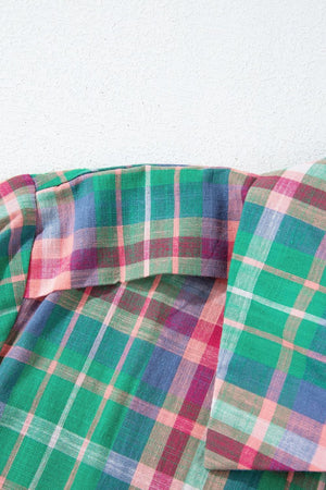 Voluminous plaid blouse with gathered sleeves in green, pink, and blue plaid fabric.