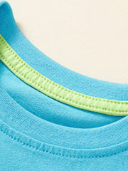 Blue cotton baby tee with lime green trim detail at the neckline.