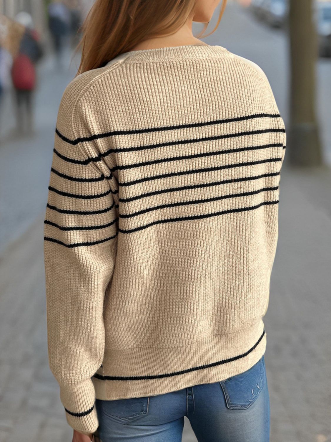 Breton stripe ribbed knit crewneck sweater in tan with black stripes, crewneck, long sleeves.