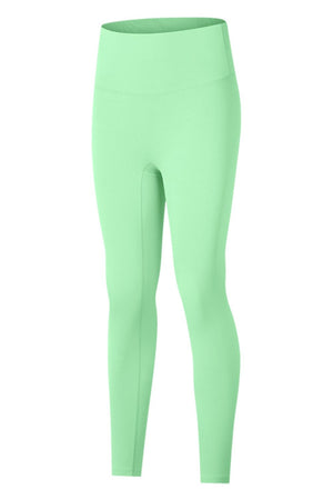 Green seamless high-waist performance leggings with a sculpted fit.
