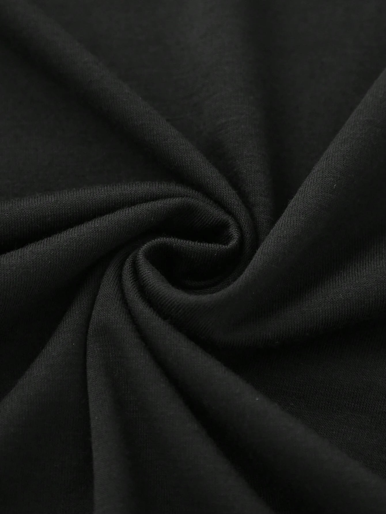Black vintage wash t-shirt fabric detail, soft cotton texture