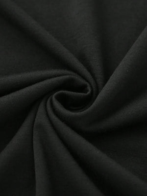 Black vintage wash t-shirt fabric detail, soft cotton texture