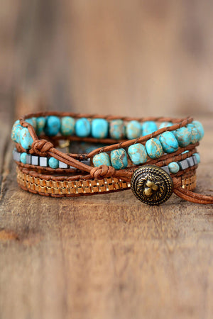 Turquoise and copper wrap bracelet set with leather cord and lion charm
