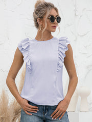 Light blue ruffled yoke sleeveless blouse with a round neckline.