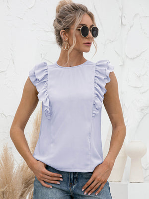 Light blue ruffled yoke sleeveless blouse with a round neckline.