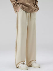 Men's khaki sweatpants with side stripes and drawstring waist