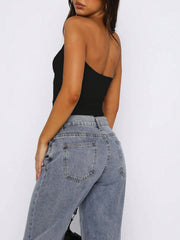Black gathered bustier bandeau top with a one-shoulder neckline.