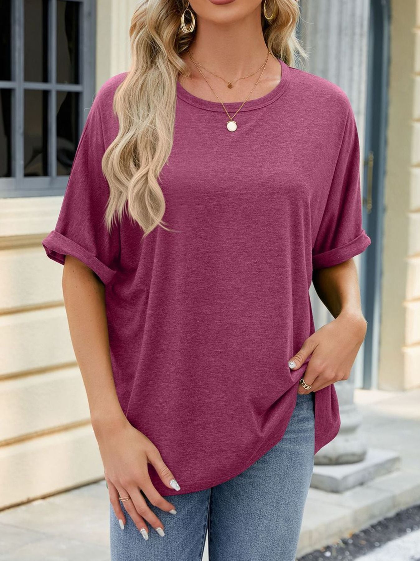 Relaxed fit t-shirt in deep purple with rolled sleeves and crew neck.