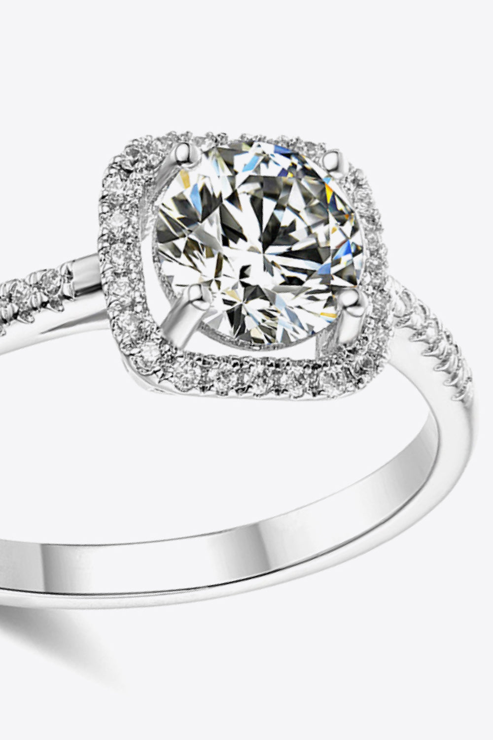 Silver moissanite halo ring with pave band in 925 sterling silver.