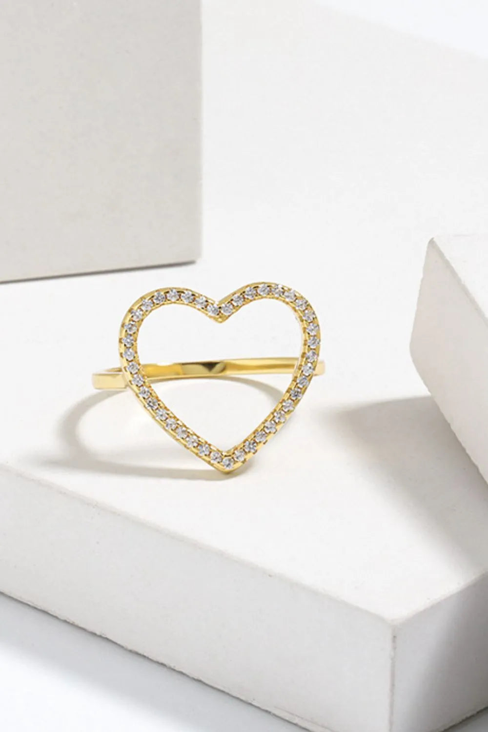 Gold pavé heart outline ring with clear stones, 18k gold-plated.