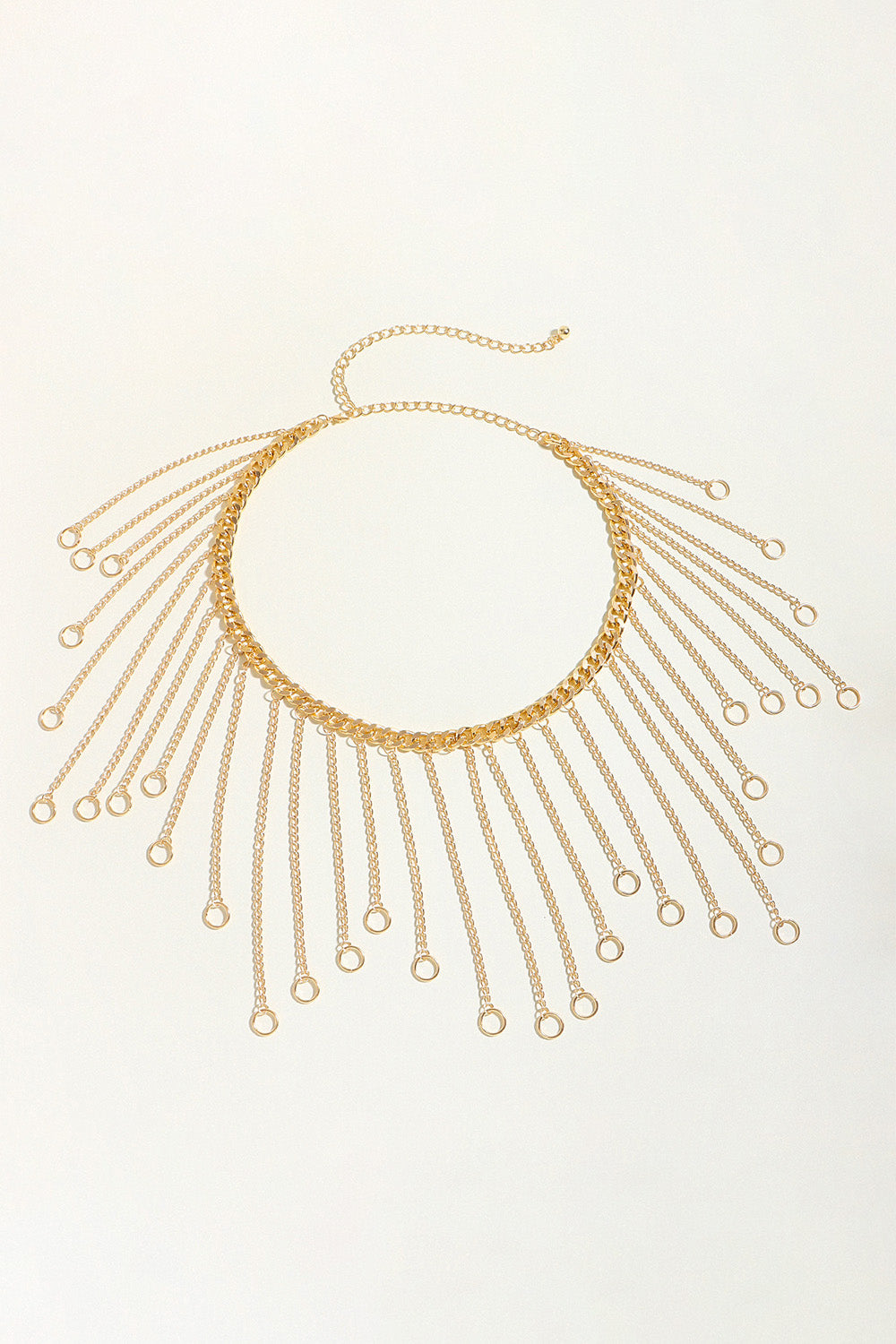Gold chainmail belt with cascading fringe chains and rings.