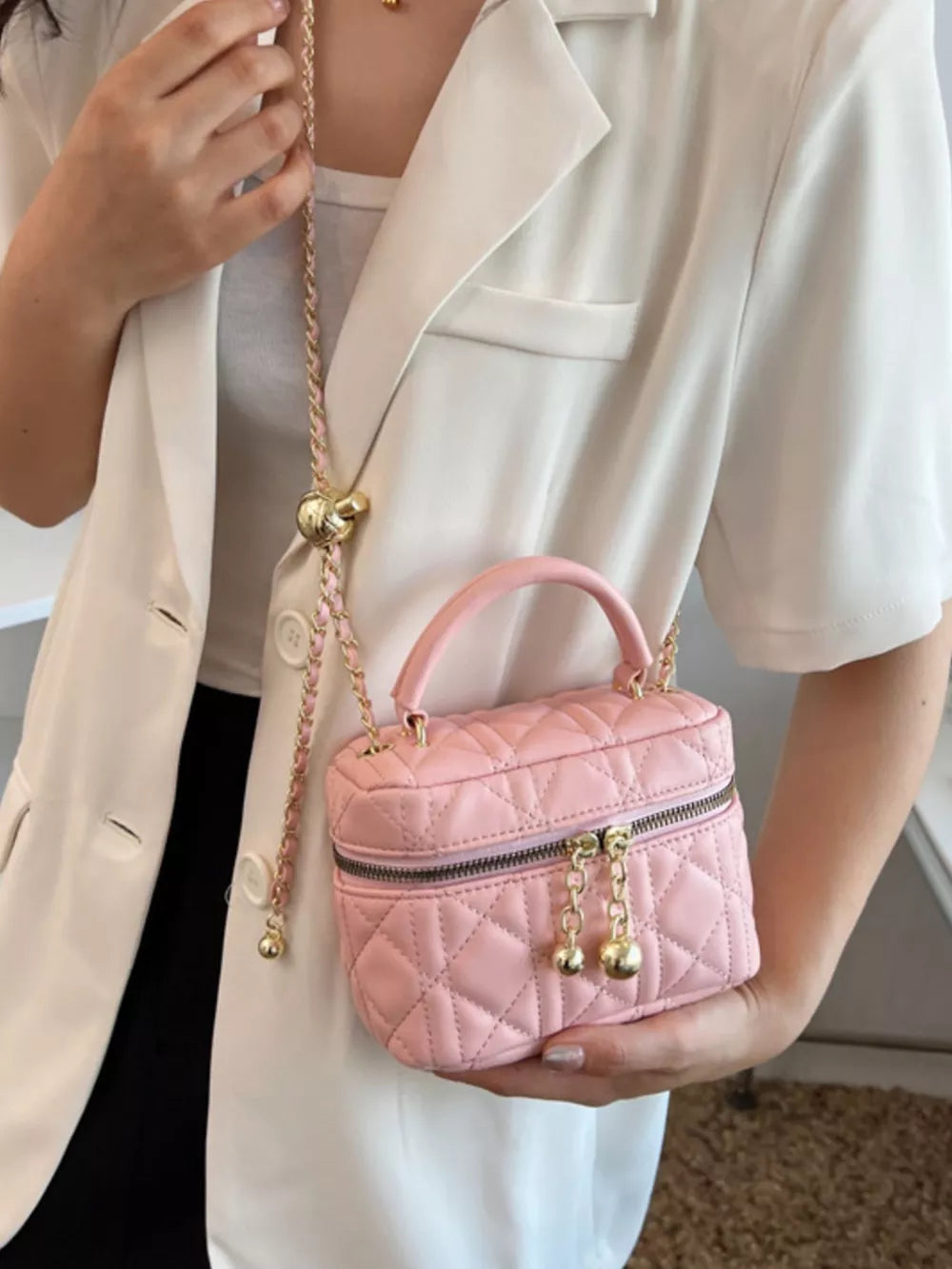 Quilted Mini Top Handle Crossbody Bag in Hot Pink, close-up detail