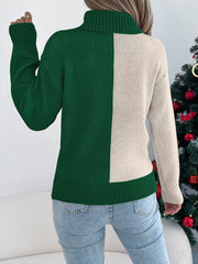Green and cream colorblock turtleneck sweater with ribbed cuffs and hem.