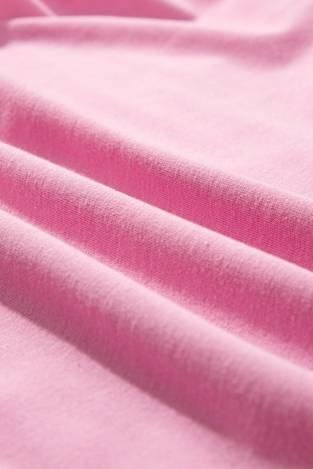 Pink cotton co-ord set with ruffled neckline detail
