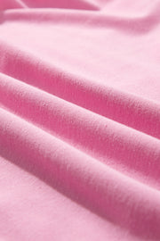 Pink cotton co-ord set with ruffled neckline detail