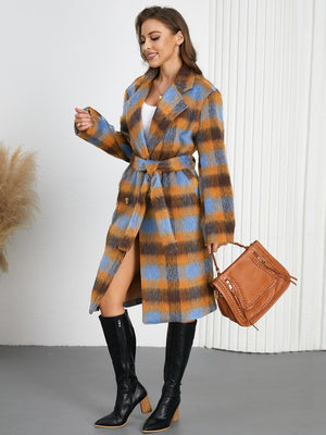 Belted bouclé overcoat with plaid pattern in blue and brown, featuring a tie waist and notched lapels.