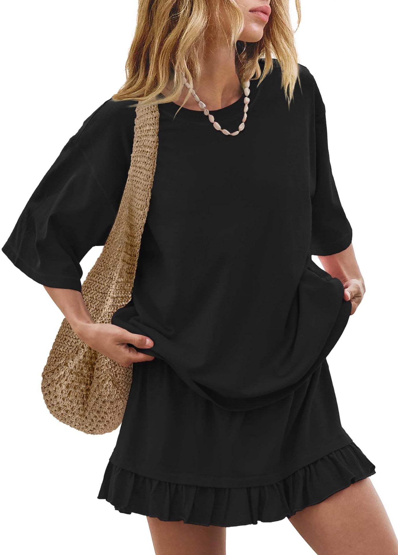Black relaxed fit tee and ruffled skirt set with a straw bag and shell necklace.