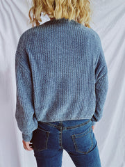Light blue ribbed knit crewneck pullover sweater with relaxed fit